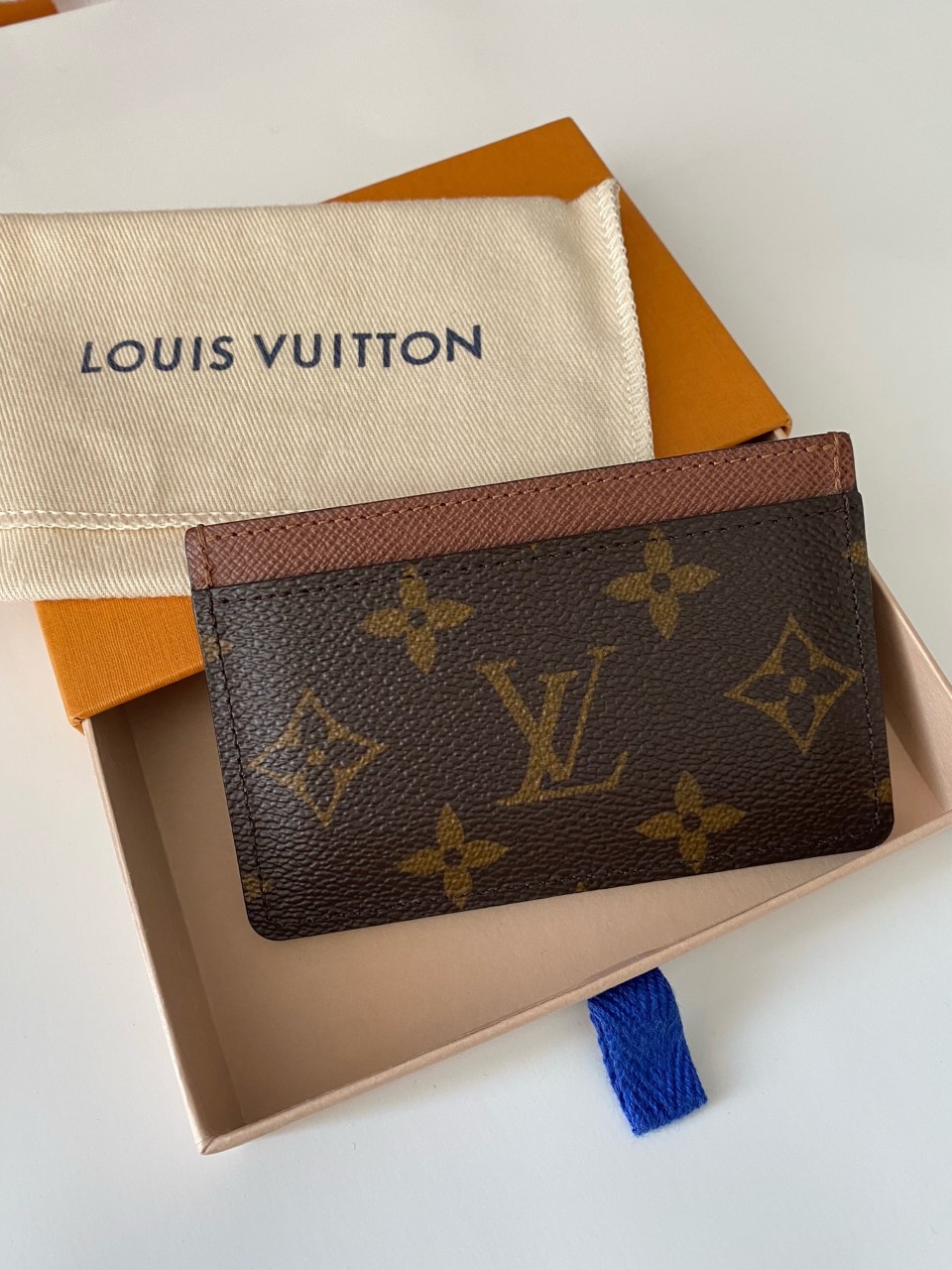 Discover Louis Vuitton Card Holder: This simple yet chic card holder in  Monogram canvas slips easily i…